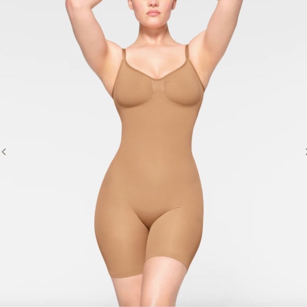SKIMS Cream Shapewear Bodysuit with Full Coverage and Scoop Neckline
